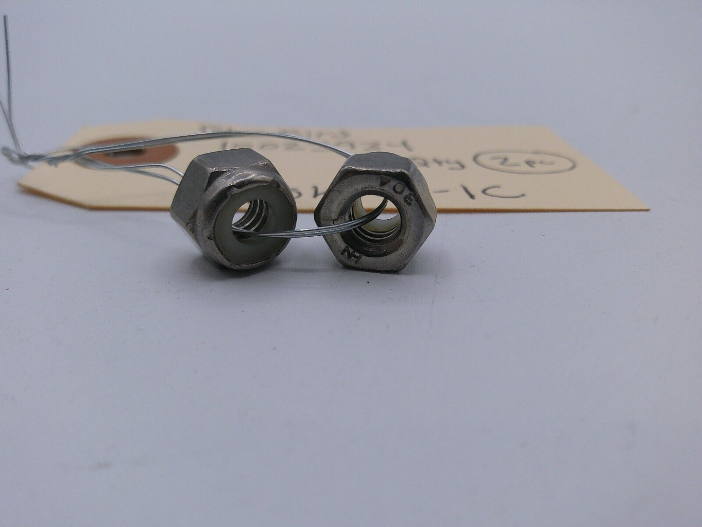 Genuine BlueBird Bus Part: 04283842 ACORN NUTS; PLASTIC (qty. 2) | DSK-02-1E