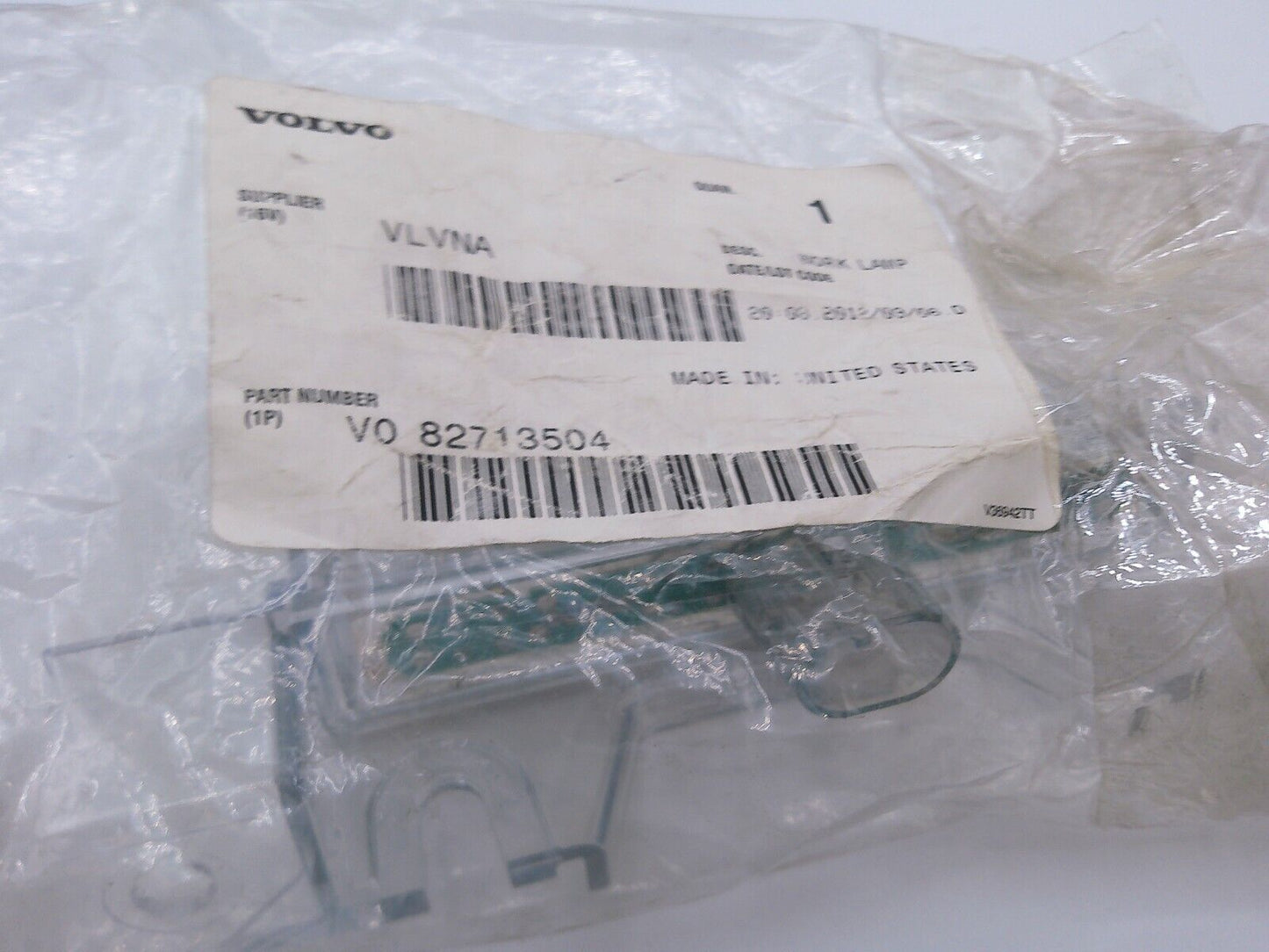 Genuine OEM Volvo 82713504 Clear Lamp | OS1-04-D