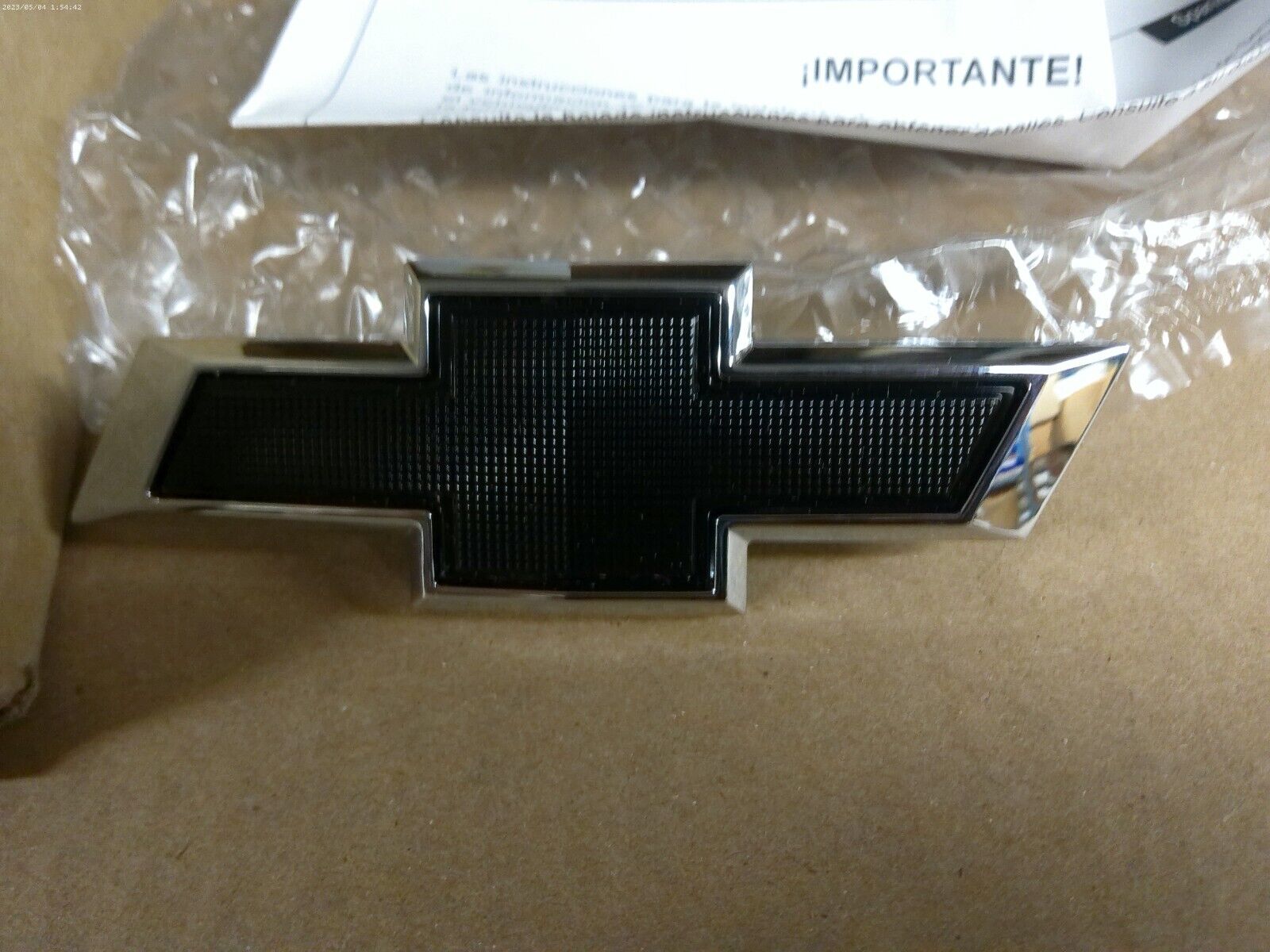 OEM 1500 2500 3500 HD Small Black Grille Bowtie Emblem 84293092 | CS12-C